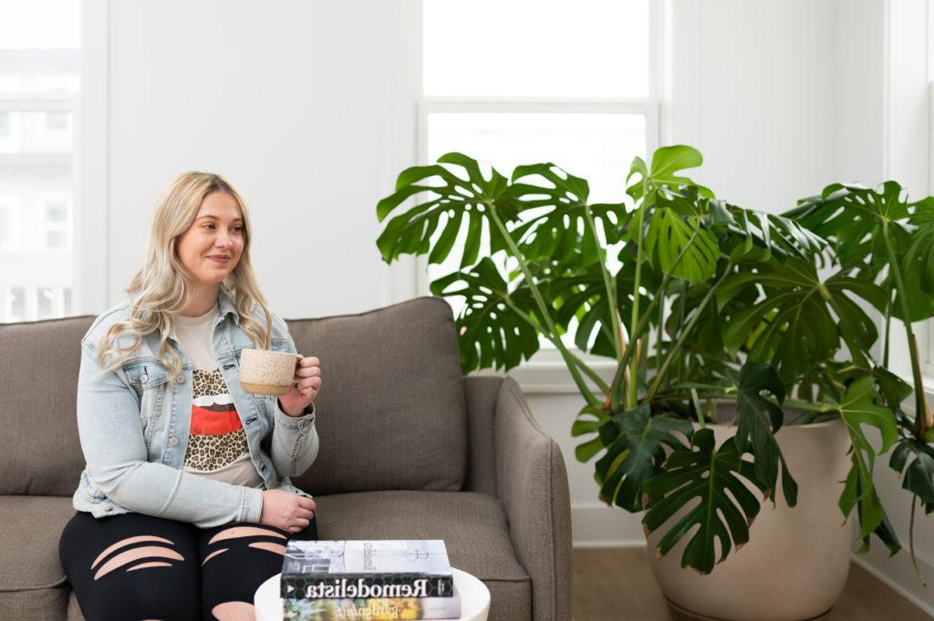 Patient drinking coffee on couch